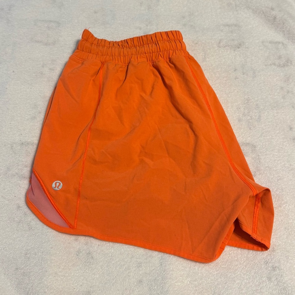 Lululemon Women’s Neon Orange Hotty Hot 4” Long shorts size 8
